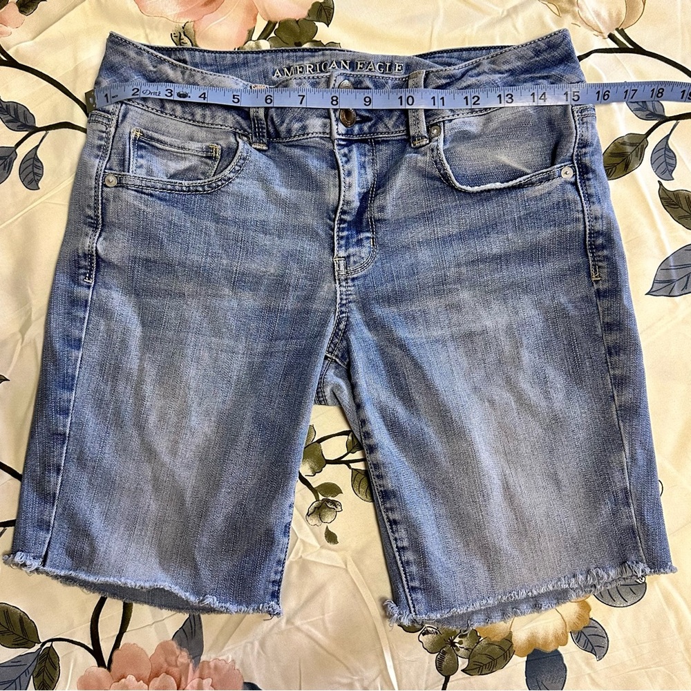 American Eagle mid thigh denim cut off shorts size 10 regular.